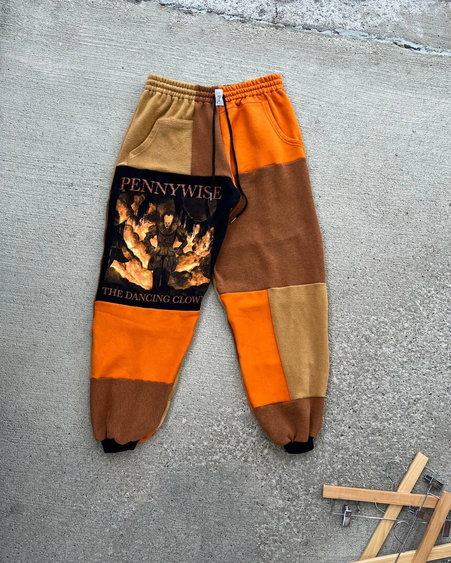 Horror character jogger pants in Halloween patchwork theme, eco-friendly vintage streetwear for fall outfits..