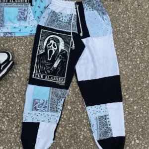 Matching patchwork jogger pants for couples, vintage Halloween streetwear with spooky eco-conscious design..