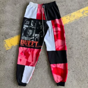 Horror character patchwork jogger pants in vintage Halloween style, sustainable streetwear for fall nights..